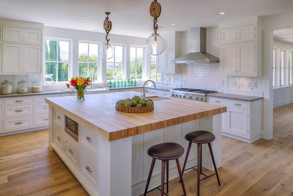 Wood countertop on white IKEA kitchen cabinets